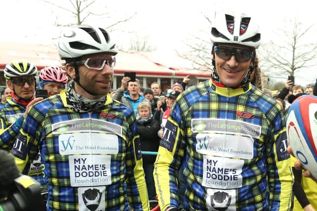 Former Scotland captain Rob Wainwright, right, with cyclist Mark Beaumont during an earlier fundraiser for the My Name'5 Doddie Foundation.