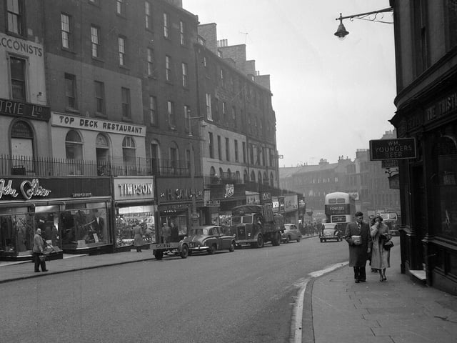Looking down Leith Street in Edinburgh towards Picardy Place in 1958. Picture shows (left hand side) the Top Deck restaurant, John Collier menswear and Timpson's shoe shop. All these shops were demolished to make way for St James Centre and King James Hotel in 1969.