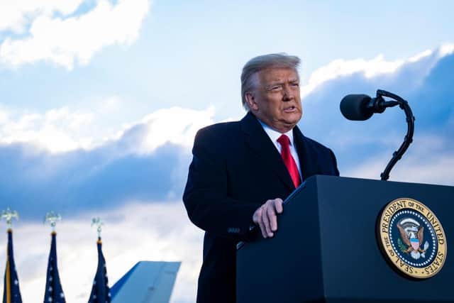 Donald Trump speaks to supporters at Joint Base Andrews before boarding Air Force One for his last time as president on 20 January 2021. (Pic: Getty Images)