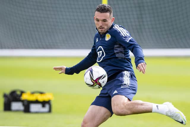 John McGinn will be in the Scotland midfield for the match against Ukraine.