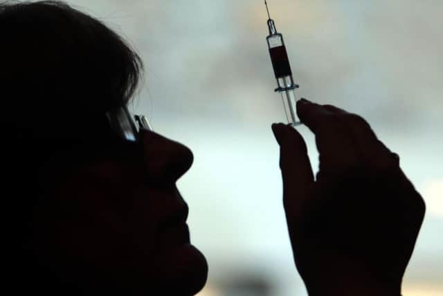 News of a Covid vaccine was welcomed in Holyrood. Picture: PA
