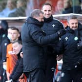 Celtic manager Ange Postecoglou (left) celebrates with his coaches John Kennedy and Gavin Strachan, and goalkeeping specialist Stevie Woods, who he was happy to inherit as he arrived alone in Scotland, despite supporter opposition to his retaining Kennedy and  Strachan. (Photo by Craig Williamson / SNS Group)