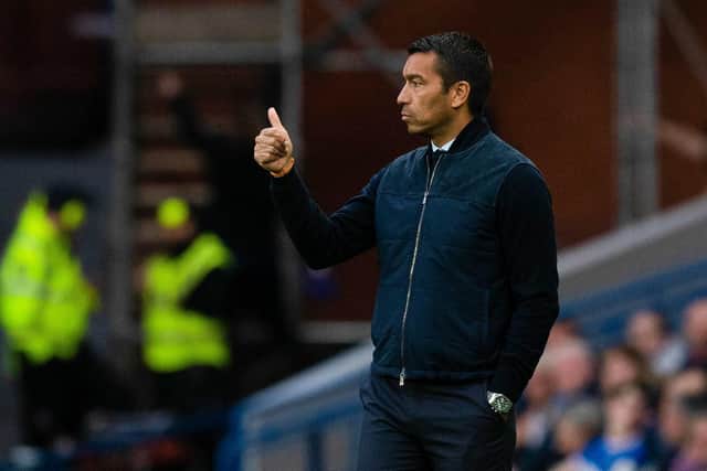 Rangers Giovanni Van Bronckhorst during  the match against Queen of the South.