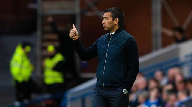 Rangers Giovanni Van Bronckhorst during  the match against Queen of the South.