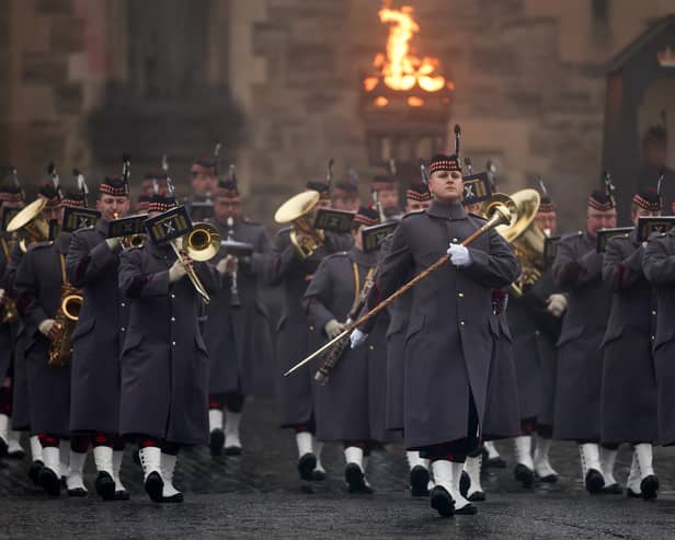 Pipers and musicians from The Royal Scots Dragoon Guards play during the Beating Retreat ceremony on the Esplanade of Edinburgh Castle to mark the transfer of the Stone of Destiny, which is moving to Perth Museum later this month. Picture: Jeff J Mitchell/Getty Images