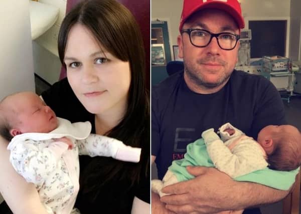 Stacy and Craig Brown, each with baby Blake
