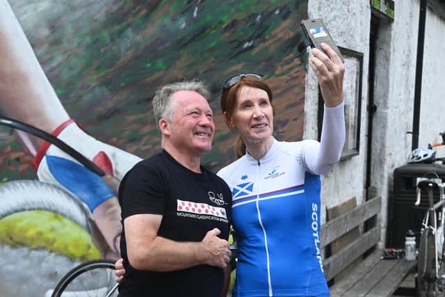 Philippa York poses for a selfie in front of the new mural at the gateway to the Campsies. Picture: John Devlin