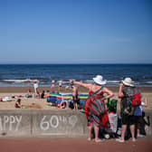 An app connected to the Internet of Things could help avoid a trip to an overly crowded beach (Picture: Jeff J Mitchell/Getty Images)