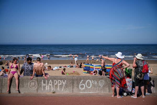 An app connected to the Internet of Things could help avoid a trip to an overly crowded beach (Picture: Jeff J Mitchell/Getty Images)