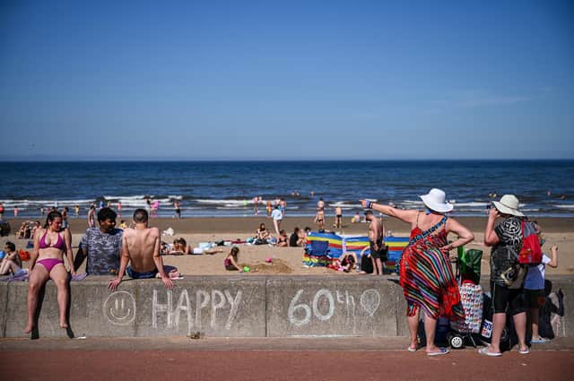 An app connected to the Internet of Things could help avoid a trip to an overly crowded beach (Picture: Jeff J Mitchell/Getty Images)