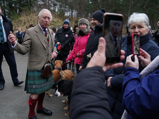 The king proves a popular draw for amateur photographers.