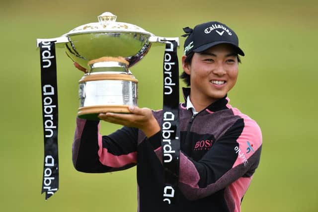 Min Woo Lee celebrates with the trophy after winning the abrdn Scottish Open at The Renaissance Club last month. Picture: Mark Runnacles/Getty Images.