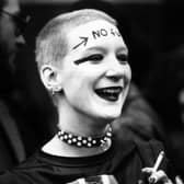 A woman with the words 'no future' written on her forehead waits outside the Rainbow Theatre, London, before a gig by The Jam and The Clash in 1977 (Picture: Chris Moorhouse/Getty Images)