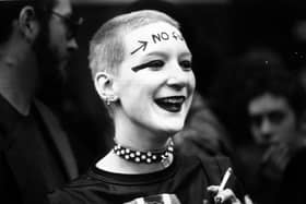 A woman with the words 'no future' written on her forehead waits outside the Rainbow Theatre, London, before a gig by The Jam and The Clash in 1977 (Picture: Chris Moorhouse/Getty Images)