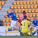 Michael O'Halloran fires the ball past Matej Vajs to put St Johnstone 2-0 up against Clyde.