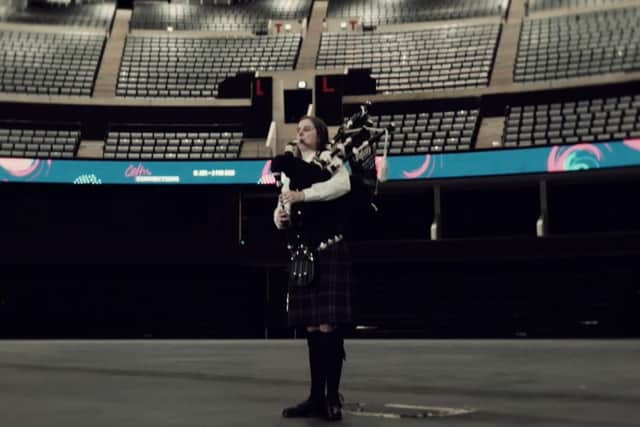 Hazel Whyte performs with the National Youth Pipe Band of Scotland.