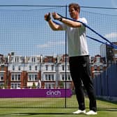 Andy Murray does stretching exercises as he practises ahead of today’s first-round match against France’s Benoit Paire