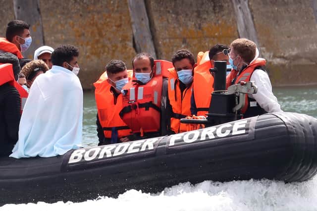 A Border Force vessel bringing a group of men thought to be migrants into Dover, Kent. Picture: Gareth Fuller/PA Wire