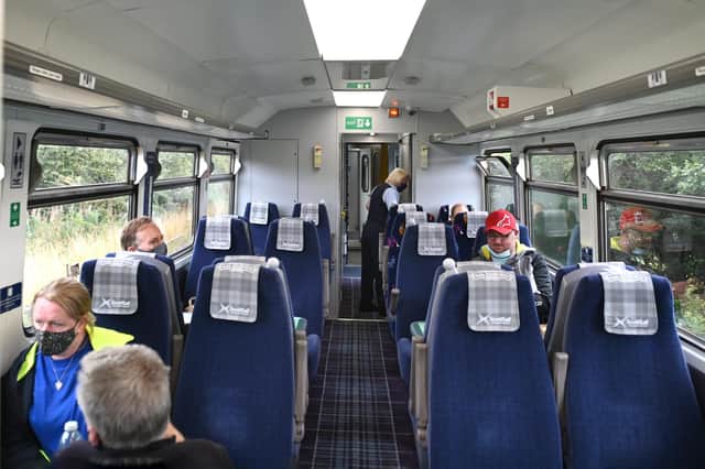 The seated area of the cycle coach has different seat covers and carpets to the rest of the train but no signs to indicate there is a  £10 supplement to use it. Picture: John Devlin