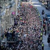 Crowd line the Royal Mile for the procession of the late Queen's coffin from the Palace of Holyroodhouse to St Giles Cathedral earlier this week