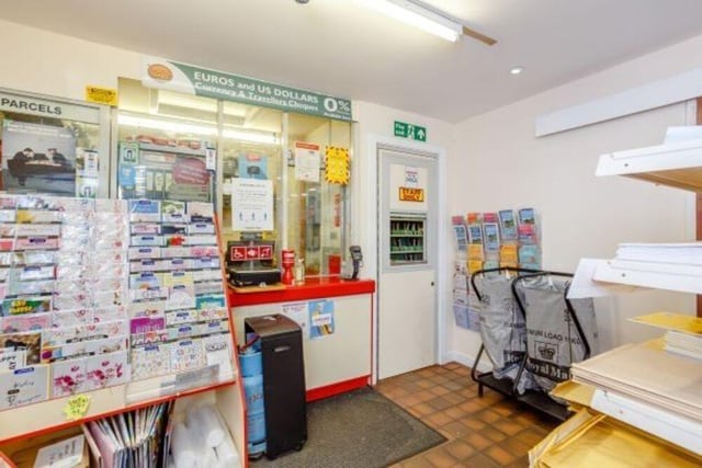 The Post Office operates from a counter at the rear of the shop.
