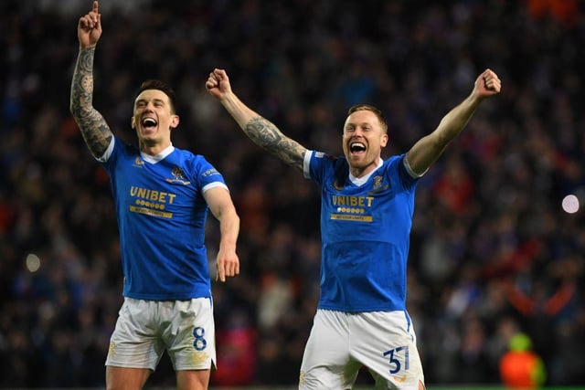 Rangers midfielders Ryan Jack and Scott Arfield react to their aggregate win after the UEFA Europa League play-off second leg. (Photo by ANDY BUCHANAN / AFP) (Photo by ANDY BUCHANAN/AFP via Getty Images)