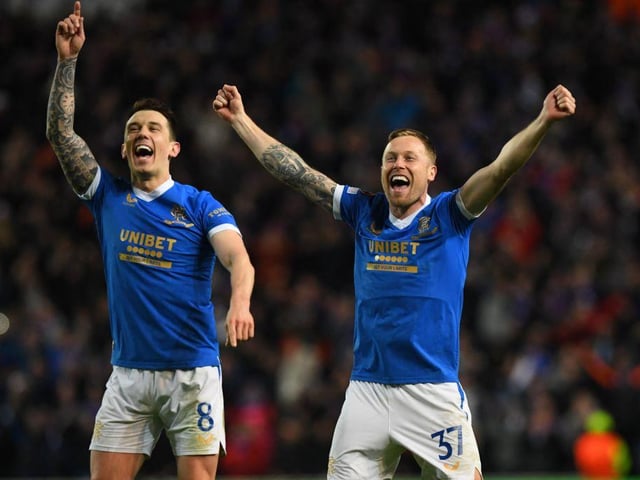 Rangers midfielders Ryan Jack and Scott Arfield react to their aggregate win after the UEFA Europa League play-off second leg. (Photo by ANDY BUCHANAN / AFP) (Photo by ANDY BUCHANAN/AFP via Getty Images)