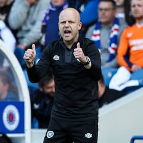 Hearts manager Steven Naismith gives his team a thumbs up during the 2-2 draw with Rangers at Ibrox.  (Photo by Ross MacDonald / SNS Group)