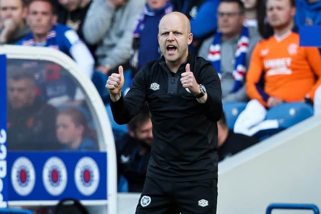 Hearts manager Steven Naismith gives his team a thumbs up during the 2-2 draw with Rangers at Ibrox. (Photo by Ross MacDonald / SNS Group)