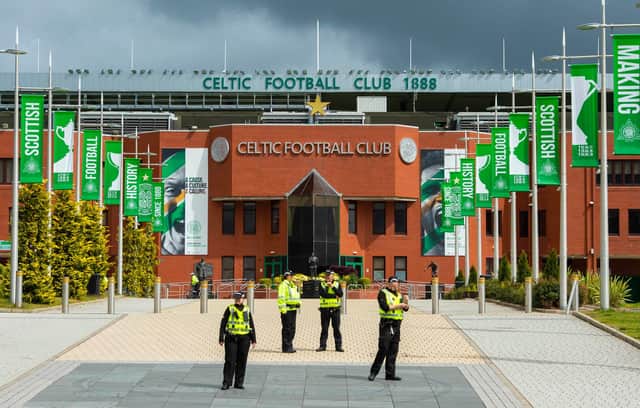 Police officers have been stationed outside Celtic Park this afternoon as the club warns fans against congregating at the stadium to celebrate their ninth title in a row. Pic: SNS Group