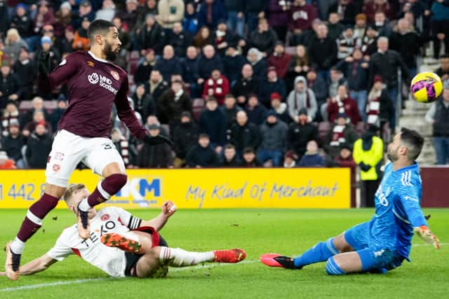 Hearts' Josh Ginnelly scores to make it 4-0 against a floored Aberdeen team at Tynecastle.