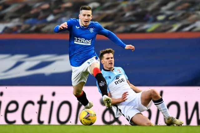 Rangers Ryan Kent and Leo Hjelde in action during a Scottish Premiership match between Rangers and Ross County at Ibrox, on January 23, 2021, in Glasgow, Scotland. (Photo by Rob Casey / SNS Group)