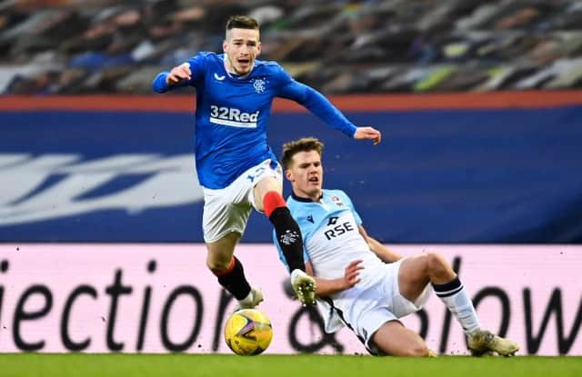 Rangers Ryan Kent and Leo Hjelde in action during a Scottish Premiership match between Rangers and Ross County at Ibrox, on January 23, 2021, in Glasgow, Scotland. (Photo by Rob Casey / SNS Group)