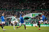 Kyogo Furuhashi curls home Celtic's second goal against Rangers.