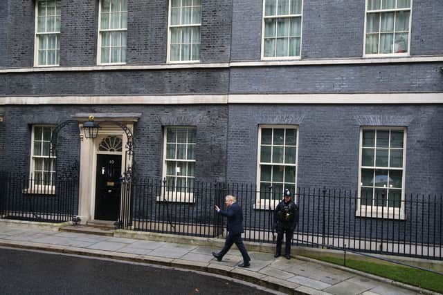 Boris Johnson arriving in Downing Street after the Conservative Party was returned to power in the General Election with an increased majority. Boris Johnson will publicly announce his resignation later today, likely before lunchtime, the BBC is reporting. Issue date: Thursday July 7, 2022.