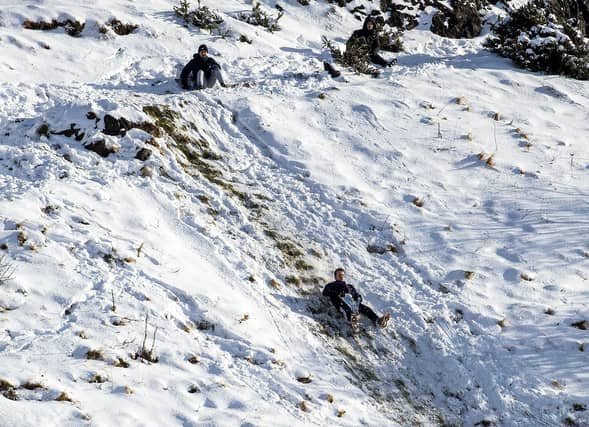 Amid the gloom of the Covid lockdown, the arrival of snow in Edinburgh has created a chance to have some fun (Picture: Lisa Ferguson)