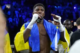 Anthony Joshua speaks to the crowd after losing the World Heavyweight Championship WBA Super IBF, IBO and WBO fight  at the King Abdullah Sport City Stadium in Jeddah