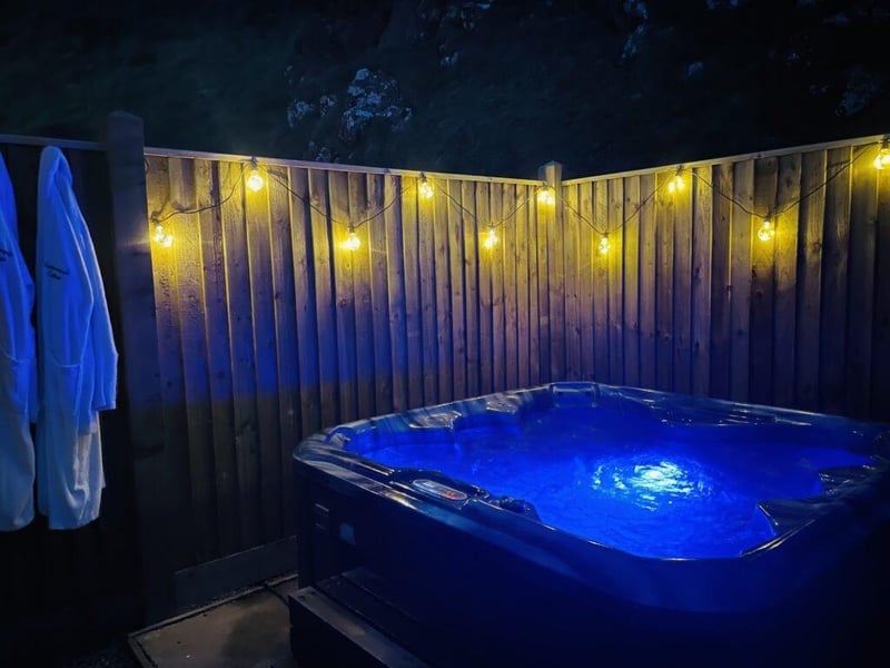 Enjoy gazing at the stars from the private hot tub.