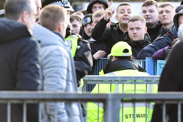 Rangers fans gather outside McDiarmid Park as the team leave the stadium following the 2-1 defeat to St Johnstone. (Photo by Ross MacDonald / SNS Group)