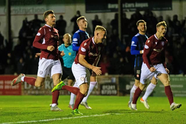 Arbroath's Nicky Low scores his penalty to make it 1-1 against Hamilton. (Photo by Bruce White / SNS Group)