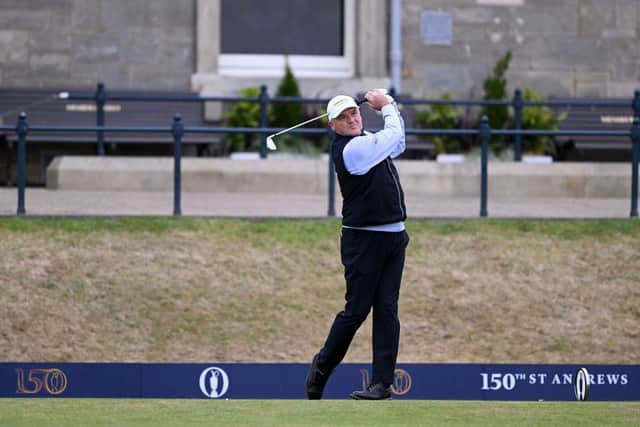 1999 winner Paul Lawrie hits the opening shot in the 150th Open at St Andrews. Picture: Ross Kinnaird/Getty Images.
