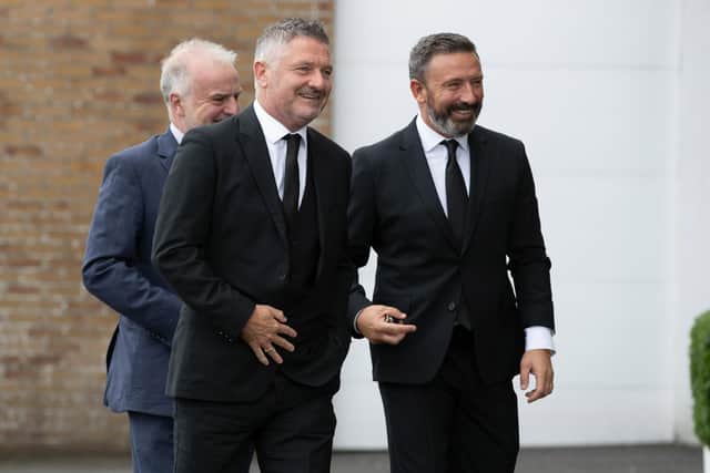 Tony Docherty and Derek McInnes during the remembrance service for former Scotland manager Craig Brown at Ayr Racecourse.