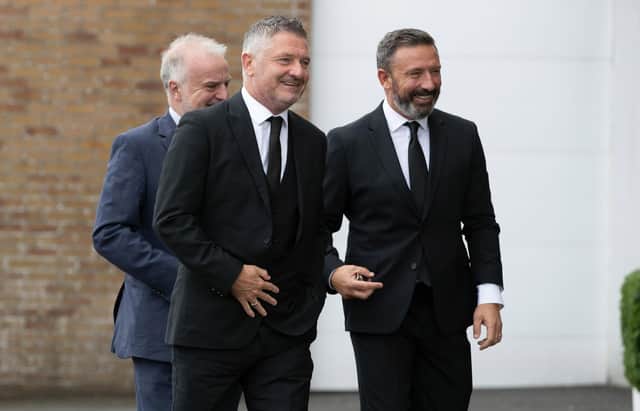 Tony Docherty and Derek McInnes during the remembrance service for former Scotland manager Craig Brown at Ayr Racecourse.