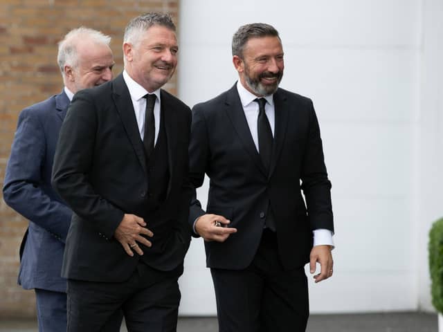 Tony Docherty and Derek McInnes during the remembrance service for former Scotland manager Craig Brown at Ayr Racecourse.