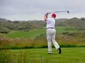 Donald Trump plays at his inaugural Scottish golf course in Balmedie, Aberdeenshire. Picture: Andy Buchanan/AFP/Getty