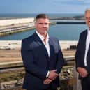 Lee Hanlon and Bob Sanguinetti at the South Harbour visitor centre overlooking the new development. Picture: Newsline Media