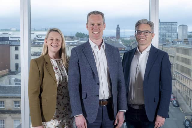 Lauren Atkins, Fraser Wilson and Jamie Drysdale, of PwC. Picture by Peter Devlin