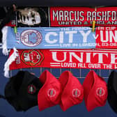 Scarves and hats for sale outside ahead of the Emirates FA Cup final at Wembley Stadium (Pic: Nick Potts/PA Wire)