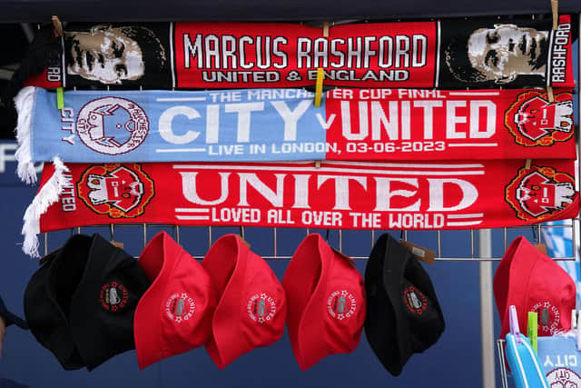 Scarves and hats for sale outside ahead of the Emirates FA Cup final at Wembley Stadium (Pic: Nick Potts/PA Wire)