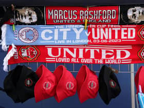 Scarves and hats for sale outside ahead of the Emirates FA Cup final at Wembley Stadium (Pic: Nick Potts/PA Wire)